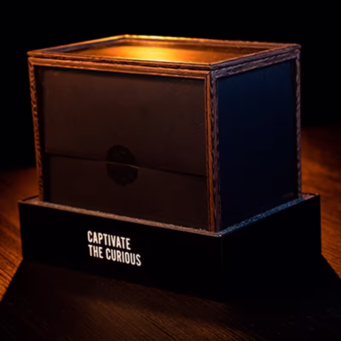 Spirit Bell Deluxe Set by Tony Anverdi, gabinete espiritual de madera y cristal cerrado sobre base negra con lema “Captivate the Curious”